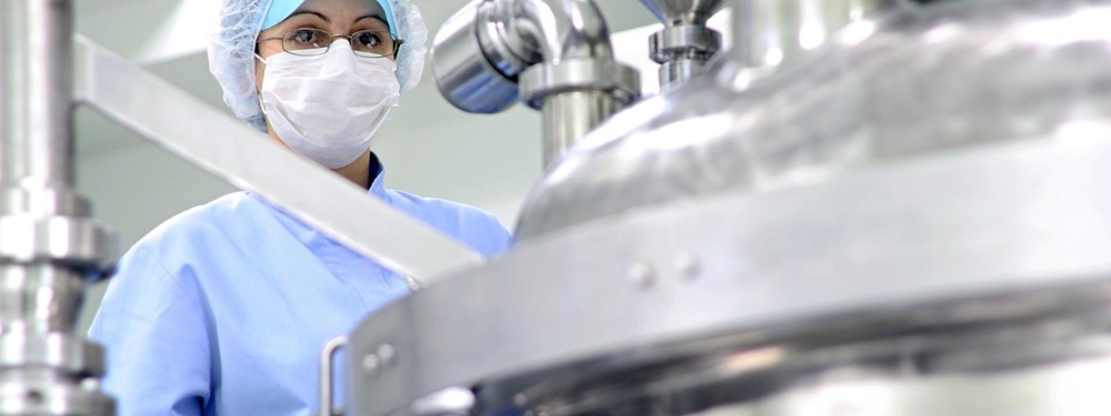 Woman in pharmaceutical manufacturing